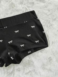 Sweetina Bộ 2 món gồm áo croptop hai dây in nơ và quần short, phong cách thường ngày dành cho tuổi teen. - màu đen - Xem 4