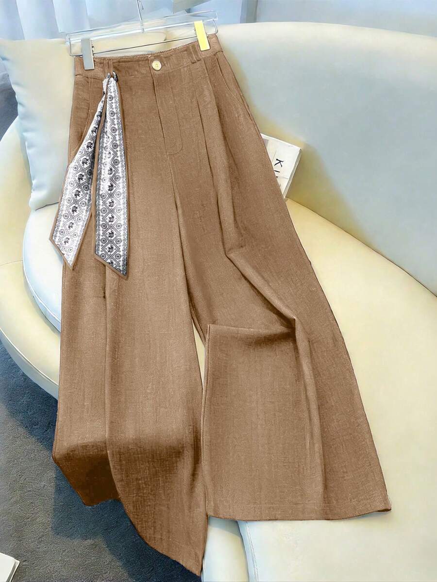 GlowEve 藏蓝色高腰弹力褶皱口袋阔腿裤,饰有优雅印花缎带,适合春夏休闲、正式、派对、假日等各种场合。 - 卡其色 - 查看 1