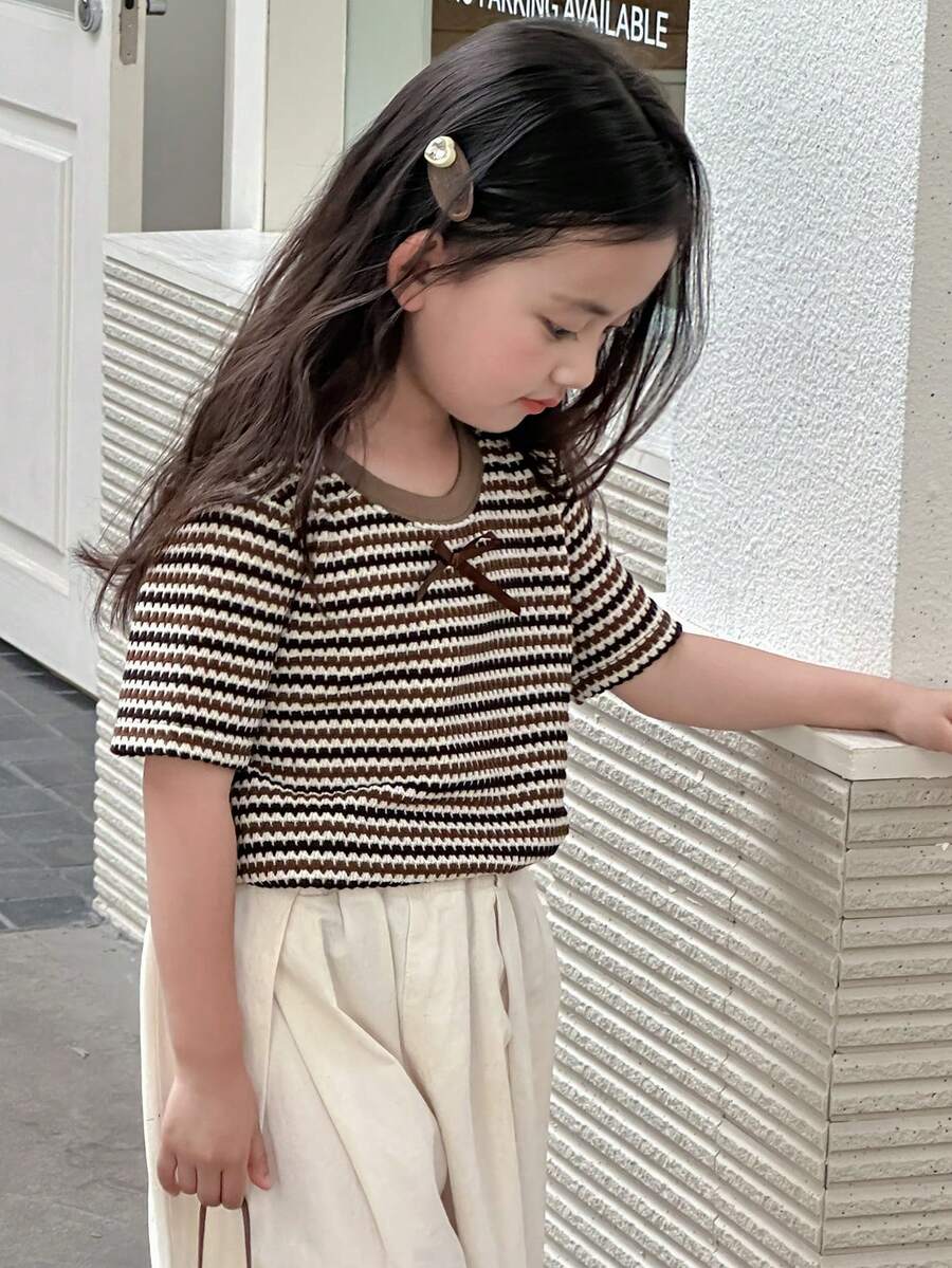 Dazy Kids تي شيرت قصير الأكمام بياقة مستديرة مزين بفيونكة طباعة كاملة للفتاة الصغيرة، صيفي - بني - مشاهدة 1