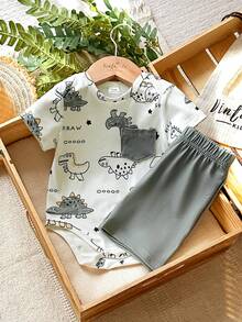 SHEIN Vintaside Kids Bộ 2 món cho bé trai sơ sinh: áo liền quần tay ngắn màu nâu in sọc xanh trắng có túi và quần short cạp chun, mềm mại và thoải mái, thích hợp mặc ở nhà và ngoài trời, mùa xuân/hè, quần short cho bé trai, quần áo sơ sinh, quần áo bé trai 0-9 tháng tuổi. - màu xanh lá - Xem 4