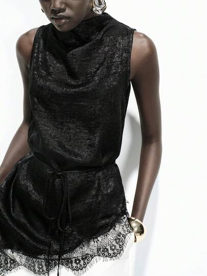 Lumivelle Camiseta de tirantes de mujer con cuello alto, bajo asimétrico y encaje de contraste, de estilo de moda primavera/verano con capas de metal y tela