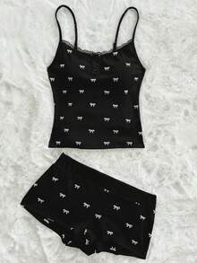 Sweetina Bộ 2 món gồm áo croptop hai dây in nơ và quần short, phong cách thường ngày dành cho tuổi teen. - màu đen - Xem 1