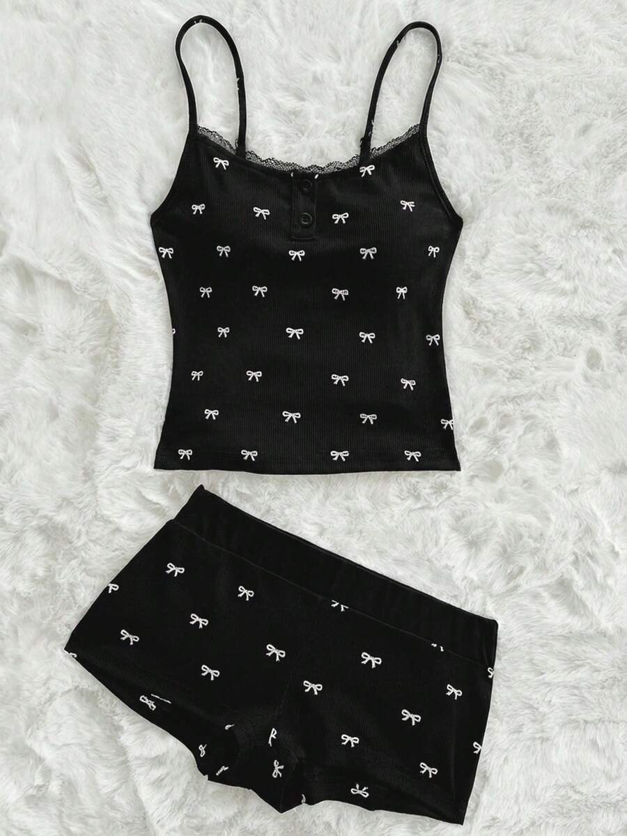 Sweetina Bộ 2 món gồm áo croptop hai dây in nơ và quần short, phong cách thường ngày dành cho tuổi teen. - màu đen - Xem 1