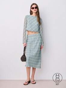 Nöista 两件套服装，包括一件长袖露脐上衣和一条高腰中长裙，采用蓝棕色格子图案。适合春夏穿着。 - 綠色 - 查看 1