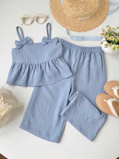 Bubblio Bộ đồ mặc nhà tối giản cho bé gái, thích hợp cho kỳ nghỉ, đi chơi, đi làm, kết hợp với áo không tay dáng chữ A và quần dài dệt họa tiết, điểm nhấn là nơ trang trí.