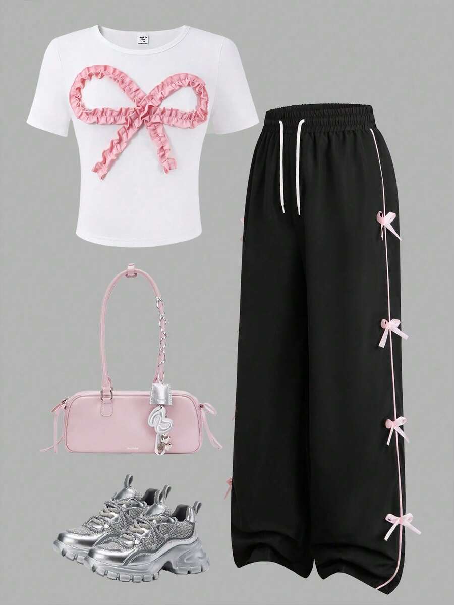 SHEIN Sparklyn 2 件套少女甜美可爱白色荷叶边蝴蝶结装饰圆领短袖短款 T 恤和黑色阔腿裤粉色蝴蝶结套装,适合日常、通勤、与朋友聚会、度假穿着 - 彩色 - 查看 1