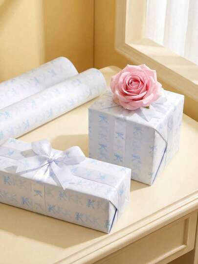 Joivida 50张/套蓝色蝴蝶结图案礼品包装纸。精致的水彩蝴蝶结图案印在哑光白色底纸上，适用于圆形或方形礼品盒。非常适合生日、情人节、节日送礼和房间装饰。