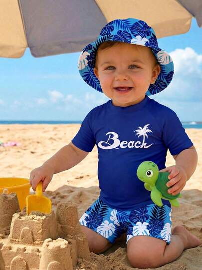 SHEIN Bộ đồ bơi ngắn tay cổ tròn dáng ôm cho bé trai, thích hợp cho mùa hè, họa tiết cây dừa nhiệt đới cổ điển, phù hợp cho bãi biển, kỳ nghỉ, bơi lội, lướt sóng.