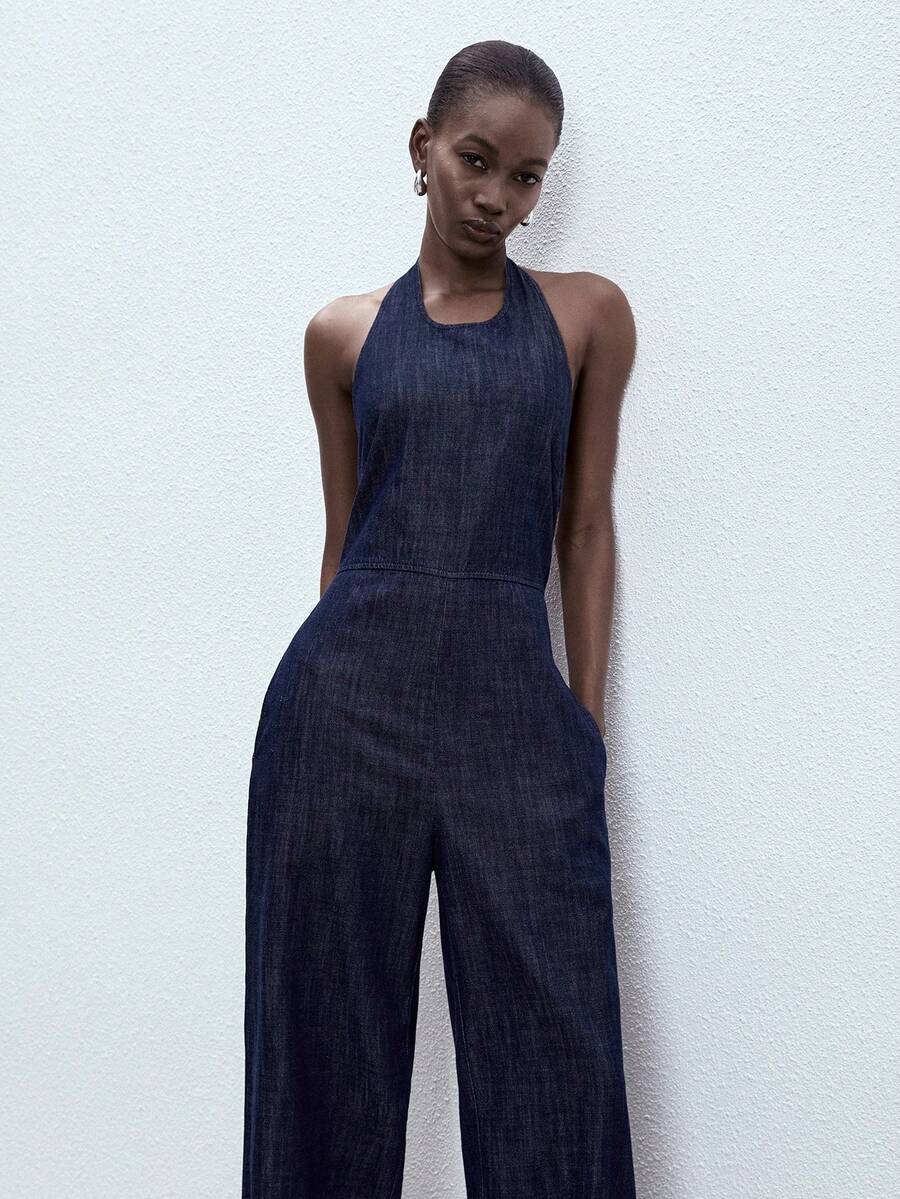 ATUI Studio 女士休闲性感露背吊带牛仔连体裤，带侧袋，适合夏季度假 - 藏蓝色 - 查看 1