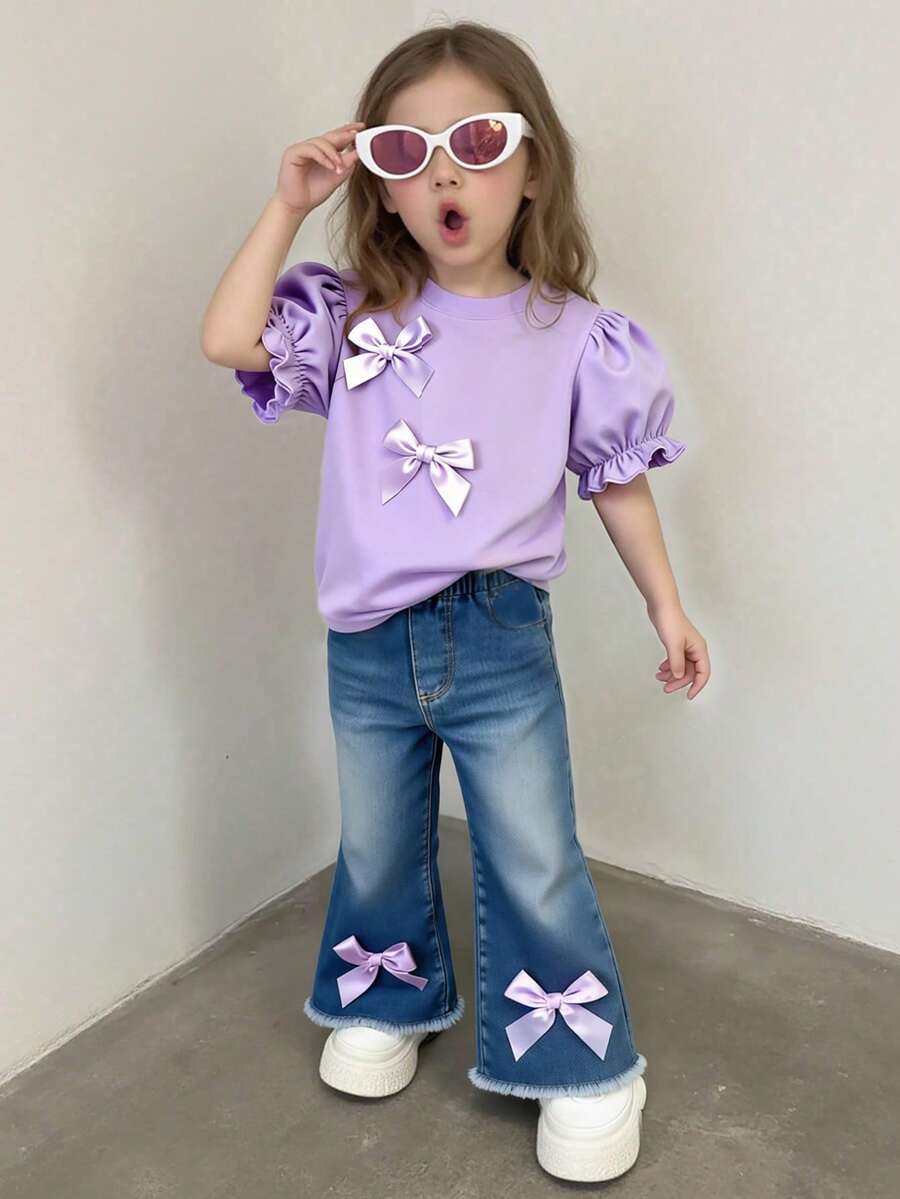 SHEIN Bộ đồ thường ngày dễ thương cho bé gái, áo tay ngắn cổ tròn màu trơn và quần ống loe kèm nơ 3D, thích hợp mặc mùa hè. - Màu tím - Xem 1