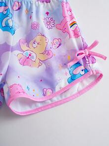 SHEIN X Care Bears Set de 2 piezas de pijama para niñas pequeñas de estilo lindo, conjunto de pantalones cortos de manga corta y cuello redondo, ropa cómoda para estar en casa, colaboración con Carebear - Multicolor - Ver 9