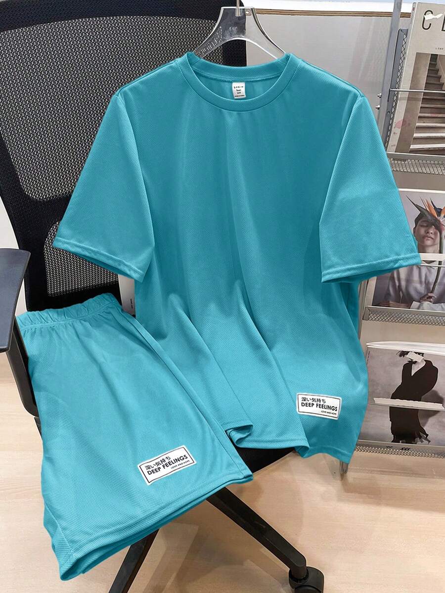 SHEIN 2件套青少年男童休闲宽松舒适logo装饰短袖上衣和短裤套装,适合春夏穿着 - 綠色 - 查看 1
