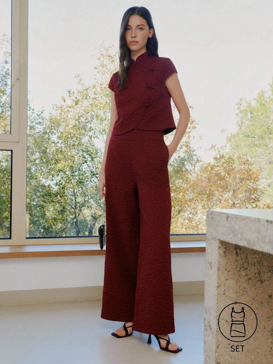 Nöista Jacquard Two Pieces Set Features A Textured Fabric In Burgundy, Chinese Buttons, Paired With Wide-Leg Pants Medium Rise. - Burgundy - View 1