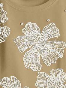 GlowEve Kaos Kasual Wanita Musim Panas Rajut Elastis Leher Bulat Raglan Lengan Pendek Berhiaskan Manik-manik dan Motif Bunga Berongga - Aprikot - View 7
