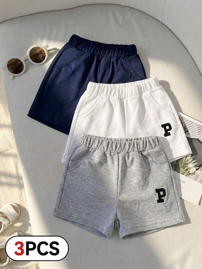 三件套婴儿短裤，白色、藏青色、灰色，优质面料，日常外出必备，时尚百搭。包含白色、藏青色和灰色三种经典颜色，裤脚饰有刺绣字母图案。采用舒适面料，弹性腰带设计，适合6个月至3岁儿童日常穿着、户外玩耍及各种活动。男童运动短裤，三件套短裤，休闲短裤，儿童短裤，童装