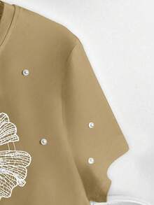 GlowEve Kaos Kasual Wanita Musim Panas Rajut Elastis Leher Bulat Raglan Lengan Pendek Berhiaskan Manik-manik dan Motif Bunga Berongga - Aprikot - View 5