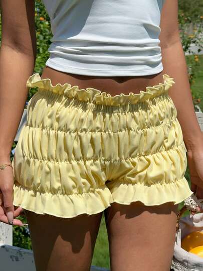 CovetEZ Women's Casual Vacation Style Solid Color Pleated Paper Bag Waist Shorts Women's Summer Yellow Smocked Ruffle Shorts Cute Tiered Elastic Waist Hotpants For Beach Or Casual Outings
Chic Ladies Yellow Ruched Frill Hem Shorts Fashionable And Comfortable Elastic Waistband Bottoms For Warm Weather
Fashion Women's Solid Yellow Tiered Ruffle Shorts Breathable And Stylish Smocked Waist Summer Drawstring Hotpants