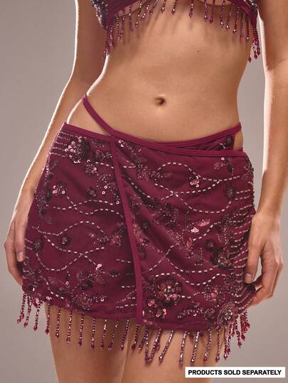 Musera Resort Minifalda envolvente con detalles de flecos y adornos, ideal para vacaciones de verano, playa, Ibiza, festivales y ocasiones elegantes