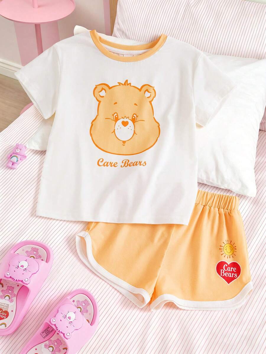 SHEIN X Care Bears 卡通印花圆领短袖上衣和撞色滚边短裤睡衣套装，适合年轻女孩 - 黃色 - 查看 1