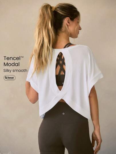GLOWMODE Camiseta holgada de manga corta de modal con abertura en la espalda, apta para yoga de bajo impacto, uso diario y casual
