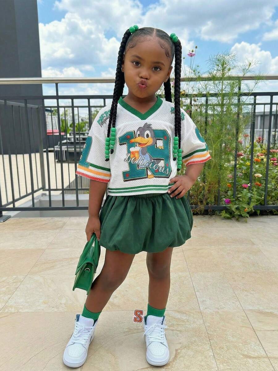 Bộ 2 món cho bé gái gồm áo thun ngắn in hình hoạt hình dễ thương và chân váy phồng, trang phục thường ngày thoải mái. - Nhiều màu - Xem 1