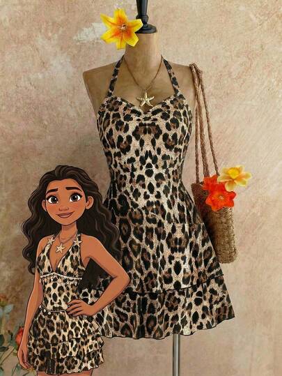 Sparklyn 这款少女豹纹吊带无袖连衣裙，让你轻松摆出各种吸睛造型！经典的豹纹印花尽显野性魅力，吊带设计露出肩颈线条，打造贴身舒适感，褶裥胸前和双层裙摆更添活泼别致的魅力。无论是派对、郊游还是约会，都能轻松展现迷人风采，让你成为人群中的焦点。