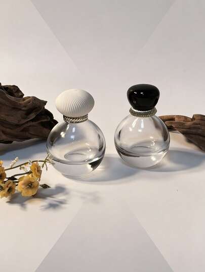 Madebyblanc 1 chai nhỏ giọt nước hoa thủy tinh hình cầu tối giản, thích hợp để bổ sung cho các chai nước hoa cỡ du lịch, có nắp cao su. Chai nhỏ giọt nước hoa rỗng di động, thích hợp để sử dụng trên bàn trang điểm, vali, túi xách. Một phụ kiện du lịch thanh lịch.