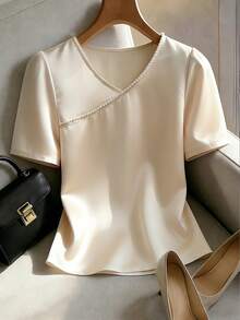 Franclia Damen elegante Satin Champagner Gold Kurzarm Bluse, locker geschnittenes asymmetrisches Perlen Dekor schickes Lässig Top - Champagnerfarben - Übersicht 1