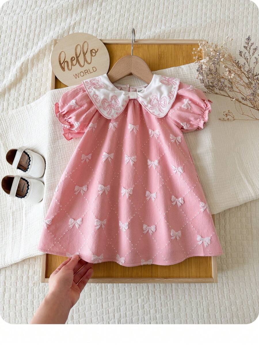 Đầm ngắn tay màu hồng dễ thương cho bé gái, cổ nơ, thích hợp cho mùa hè. - Hồng - Xem 1