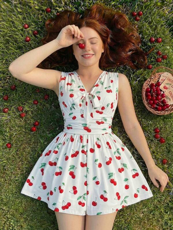 SHEIN MOD Bộ jumpsuit ngắn màu trắng ngà, cổ chữ V, eo nhún, họa tiết hoa anh đào, trang trí nơ phía trước, thích hợp cho kỳ nghỉ, mặc thường ngày, cỡ lớn.