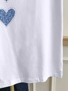 Resyla Camiseta de manga corta casual de cuello redondo con recorte de contraste y gráfico de corazón para mujer de talla grande - Blanco - Ver 5