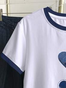 Resyla Camiseta de manga corta casual de cuello redondo con recorte de contraste y gráfico de corazón para mujer de talla grande - Blanco - Ver 4