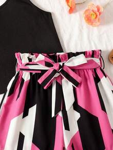 Bộ đồ 2 món cho bé gái tuổi teen: Áo tank top đen và quần short cạp chun họa tiết da báo. - Nhiều màu - Xem 4