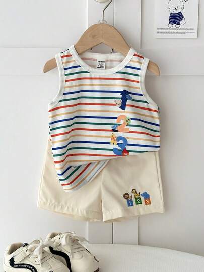 SHEIN Playful Pals Set de 2 piezas: Top de tirantes a rayas + Pantalones cortos color albaricoque. Top de tirantes con rayas de colores y estampado de números de dibujos animados, tela de punto suave y cómoda. Pantalones cortos color albaricoque con bordado de animales de dibujos animados, cintura elástica. Adecuado para niños de 6 meses a 3 años, para uso diario, juegos al aire libre. Conjunto de niño, conjunto de top, ropa infantil, conjunto informal, conjunto de pantalones cortos, conjunto de bebé e infante.