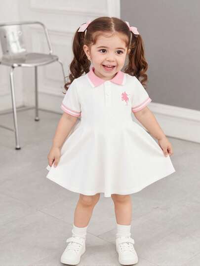 SHEIN 女婴粉色休闲连衣裙，罗纹领口和袖口，适合居家休闲、外出、运动、聚会等场合。