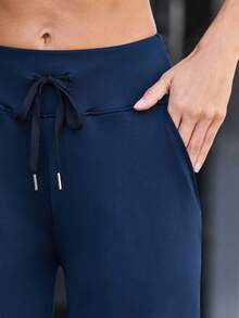 Denimoi Women's Sports Yoga Flare Pants With Criss-Cross Waistband & Letter Print - Navy Blue - View 3