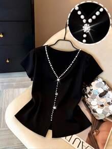 Qadelle Blouse ajustée à manches courtes avec décor floral de perles et de strass, style urbain chic et élégant. Convient pour le port quotidien, les mariages, les galas, les trajets, les fêtes de remise de diplômes, les vacances, les sorties, les fêtes, Halloween, Noël, le Nouvel An, Thanksgiving, les mariages - Noir - Voir 1
