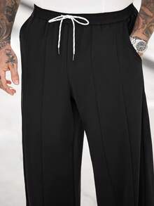 Manfinity CasualCool Quần nam ống rộng, dáng suông, có dây rút ở eo và túi, kiểu dáng thường ngày. - màu đen - Xem 5