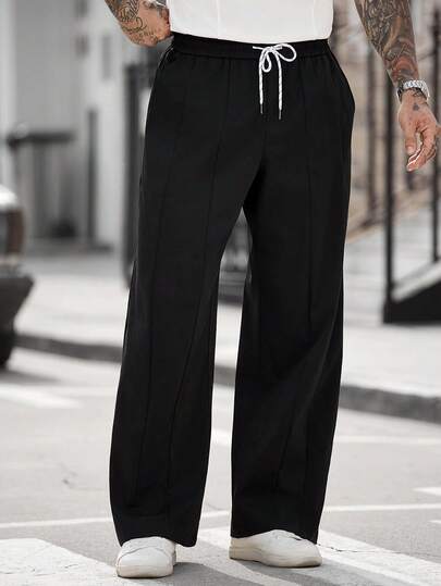 Manfinity CasualCool Quần nam ống rộng, dáng suông, có dây rút ở eo và túi, kiểu dáng thường ngày.