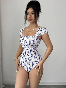 Elenzga 新款女士方领短袖印花腰部褶皱A字连体衣，优雅适合约会和度假，收腰设计，显瘦塑形 - 藍色 - 查看 6