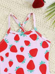 SHEIN Bộ đồ bơi in hình dâu tây cho bé gái, màu hồng chủ đạo, chất liệu mềm mại và co giãn, kiểu áo liền thân có dây đeo chéo kèm váy, set 2 món, thân thiện với da, nhanh khô, thoáng khí, thích hợp cho bé gái mặc ở bãi biển, hồ bơi. - Nhiều màu - Xem 4