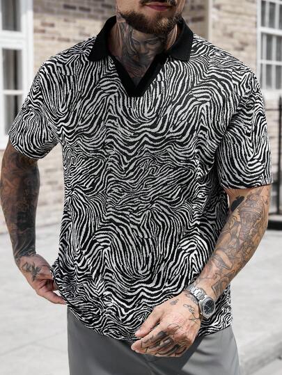 Manfinity CasualCool Áo polo nam phối chất liệu tương phản, cổ bẻ, thích hợp cho các hoạt động ngoài trời.