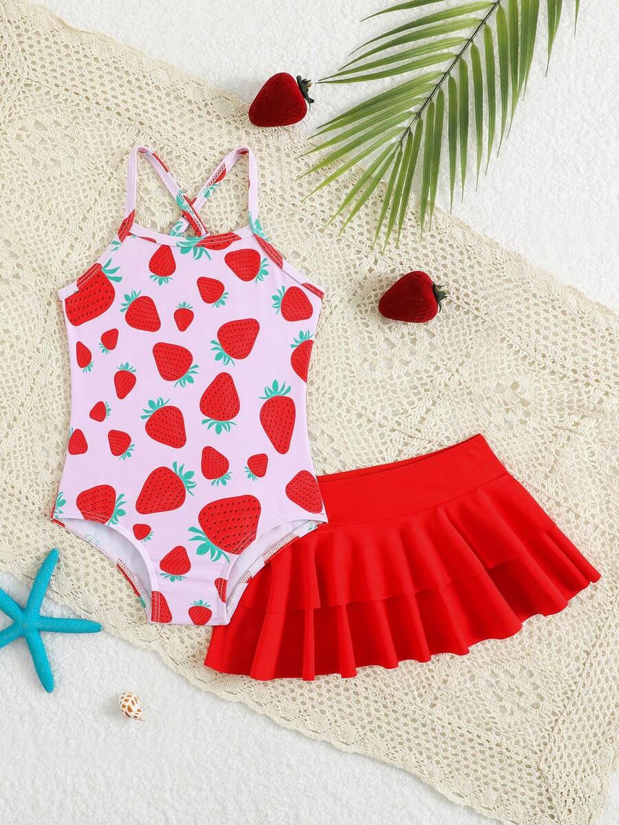SHEIN Bộ đồ bơi in hình dâu tây cho bé gái, màu hồng chủ đạo, chất liệu mềm mại và co giãn, kiểu áo liền thân có dây đeo chéo kèm váy, set 2 món, thân thiện với da, nhanh khô, thoáng khí, thích hợp cho bé gái mặc ở bãi biển, hồ bơi. - Nhiều màu - Xem 1