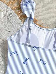 Bộ đồ bơi liền thân in hình bướm cho bé gái, có viền bèo nhún, màu xanh dương, thích hợp cho bãi biển, kỳ nghỉ hè. - Nhiều màu - Xem 4