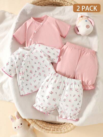Bộ đồ 2 món dễ thương cho bé gái sơ sinh, màu trơn và họa tiết hoa nhí, gồm áo tay bồng và quần short, thích hợp cho mùa hè.