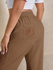 Elaquor Plus Size Women Casual Pants With Eye Embroidery Pockets - Camel - View 2