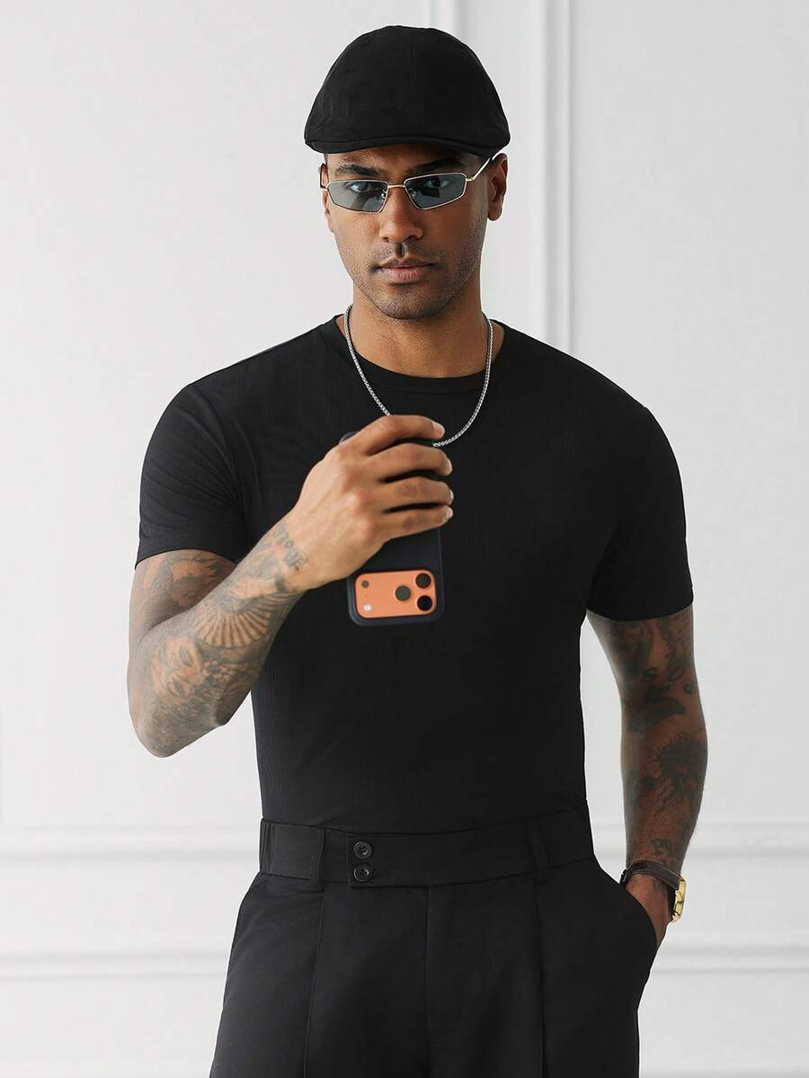HUEFORM Camiseta de punto de manga corta de cuello redondo de unicolor, ajuste slim, casual para hombre, verano - Negro - Ver 1