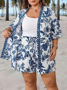 SHEIN CURVE+ Kích cỡ US22 (dành cho người có thân hình đầy đặn) Thích hợp cho lễ hội âm nhạc, kỳ nghỉ bên bờ biển, phong cách bohemian. Áo kimono in hoa dáng rộng mở phía trước và quần short cạp chun. Trang phục thường ngày thoải mái cho nữ. - Màu xanh lam - Xem 6