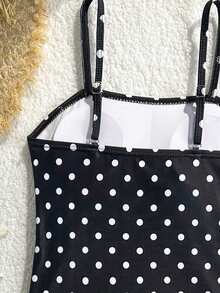 SHEIN Bộ bikini chấm bi cho bé gái tuổi teen, kiểu dáng retro dễ thương, ôm sát, đồ bơi mùa hè cần thiết cho việc đi bơi và nghỉ mát, đồ bơi trẻ em chấm bi đen trắng cổ điển, thiết kế dây mảnh + eo nhún, ngọt ngào và nữ tính, hoàn hảo cho ảnh chụp ở hồ bơi, phù hợp cho kỳ nghỉ, tiệc bể bơi, bơi biển. Đồ bơi chấm bi, đồ bơi chấm bi cho thiếu nữ, đồ bơi chấm bi cho thanh thiếu niên, đồ bơi chấm bi che phủ toàn thân. - Đen và trắng - Xem 6