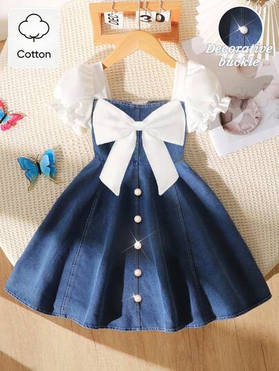 Elladie kids Tween Girls' Spring/Summer Casual Fashion Dress, White Bow Decor On Front, White Metal Pearl Button On Front Hem, Woven Fabric White Solid Color Short Puff Sleeve Spliced Blue Denim Waist Dress, Suitable For Spring/Summer Back To School, Sweet & Cute Lady-Like Casual Fashion Outfit, Suitable For Daily School, Outing, Vacation, Photography, Spring/Summer Wear.Summer Outfits..Squishy Dress.Island Style,Beachweekend. Youth Girl Clothes, Cute Dresses For Girls.
